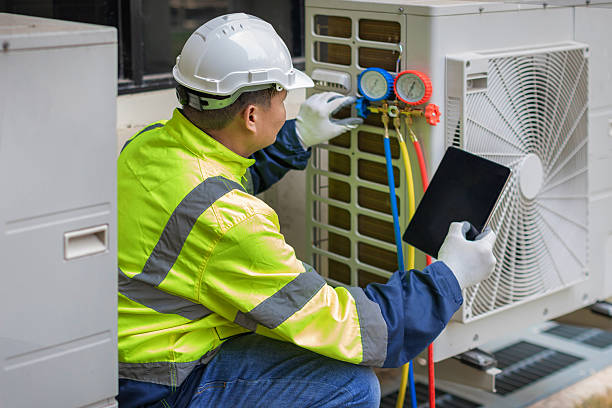 Professional Heat Pump Repair technician working in Fulshear, TX